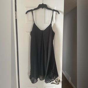 Black party dress with lace details on sides